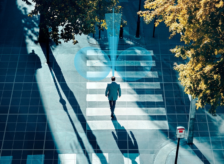 Man crossing street with representation of his focus and peripheral field of vision
